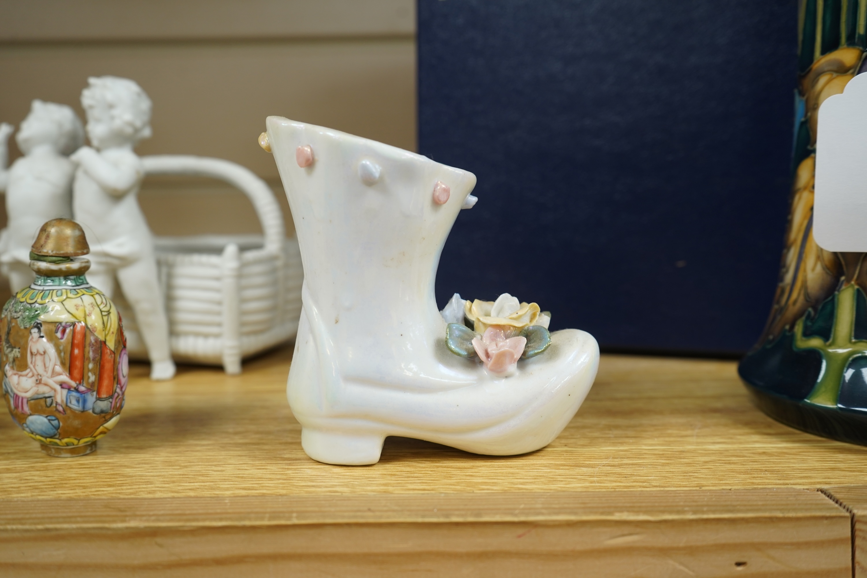 A French porcelain figure of a Mansion House dwarf, various German porcelain figures, an engraved glass and bowl. Glass 19cm